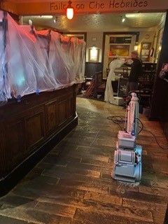 Photo of flooring in a commercial premises which in the process of being restored by sanding and oiling, performed by SR Flooring in Edinburgh