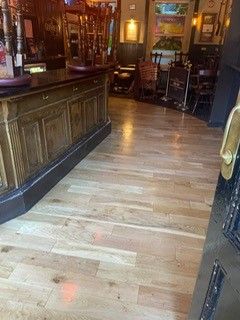 Photo of flooring in a commercial premises which has been restored by sanding and oiling, performed by SR Flooring in Edinburgh