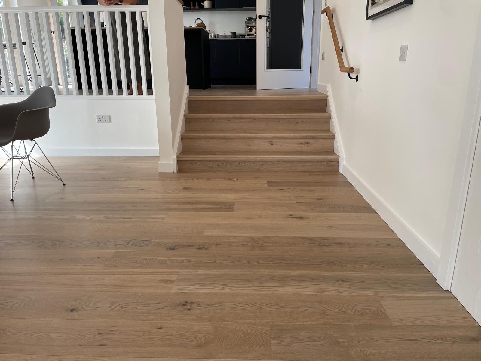 Photo of newly laid hardwood flooring in a domestic home, performed by SR Flooring in Edinburgh