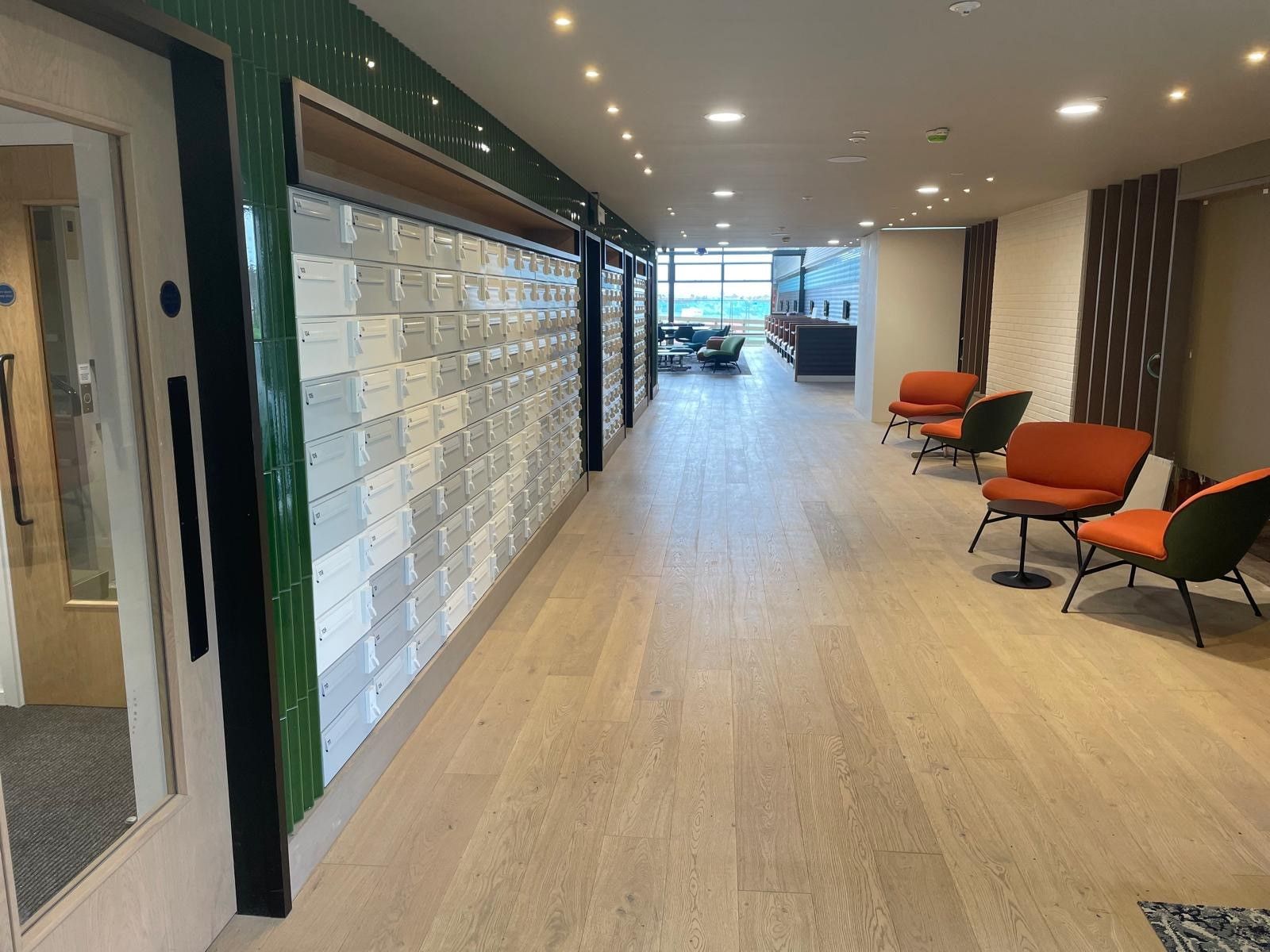 Photo of newly laid hardwood flooring in a commercial premises, performed by SR Flooring in Edinburgh